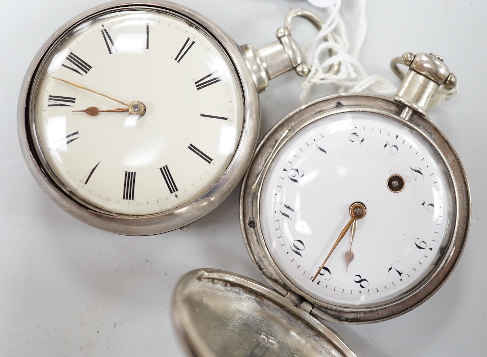 A 19th century silver pair cased kewind verge pocket watch, by Broad of London and a similar hunter pocket watch by Brown of Winchester.